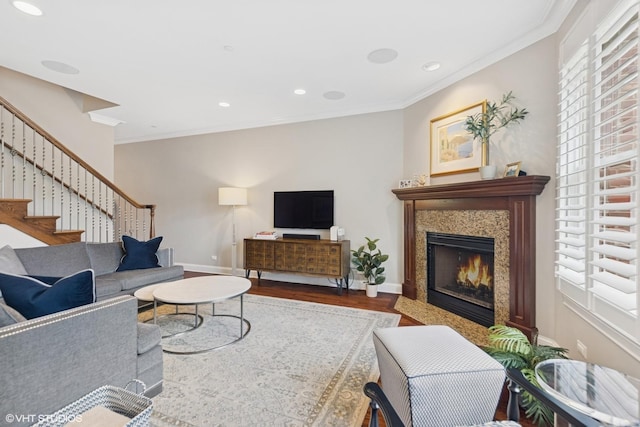 716 Kingsbrook Gln, Glen Ellyn, IL 60137 - living room featuring wood finished floors, stairway, baseboards, plenty of natural light, and crown molding