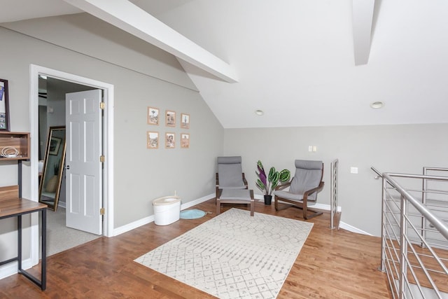 916 N Wood St Unit 3, Chicago, IL 60622 - living area with lofted ceiling, wood finished floors, and baseboards