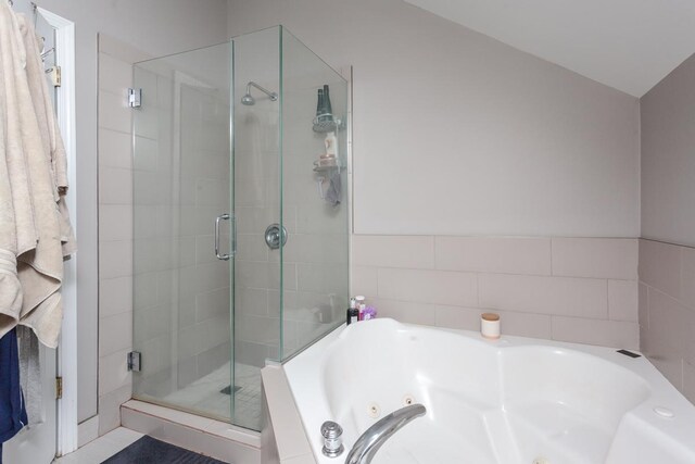 916 N Wood St Unit 3, Chicago, IL 60622 - bathroom with a stall shower and a whirlpool tub