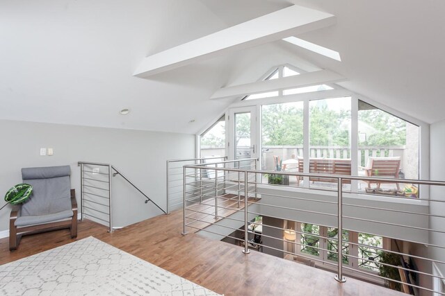 916 N Wood St Unit 3, Chicago, IL 60622 - interior space featuring wood finished floors, a skylight, and vaulted ceiling