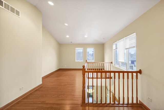 5301 S Mobile Ave, Chicago, IL 60638 - spare room with baseboards, wood finished floors, and recessed lighting