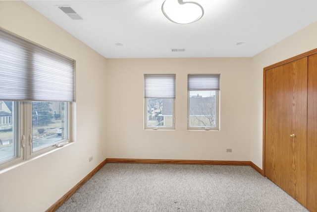 5301 S Mobile Ave, Chicago, IL 60638 - unfurnished bedroom featuring carpet flooring, baseboards, and a closet