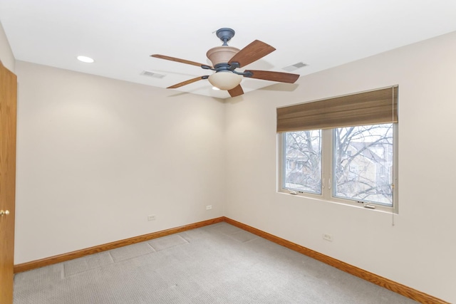 5301 S Mobile Ave, Chicago, IL 60638 - empty room with baseboards, a ceiling fan, light carpet, and recessed lighting