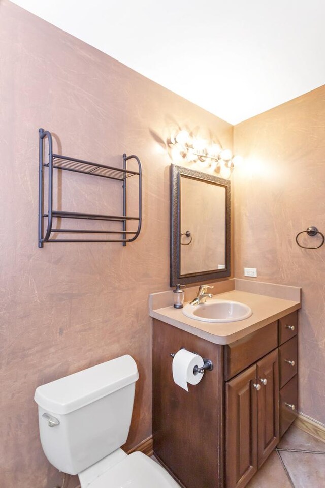 5301 S Mobile Ave, Chicago, IL 60638 - bathroom featuring toilet and vanity
