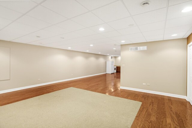 5301 S Mobile Ave, Chicago, IL 60638 - finished basement featuring wood finished floors, baseboards, a drop ceiling, and recessed lighting