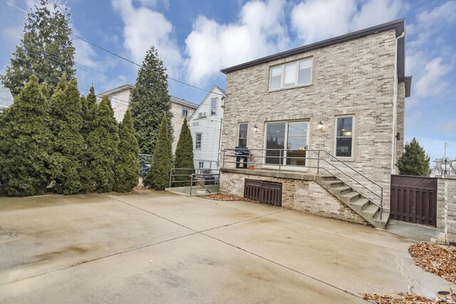 5301 S Mobile Ave, Chicago, IL 60638 - rear view of house featuring brick siding