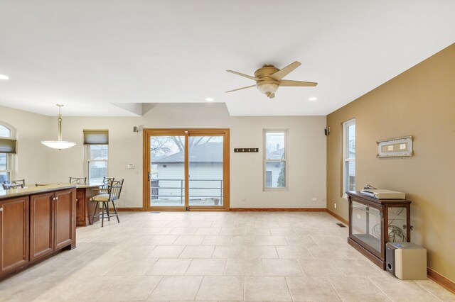 5301 S Mobile Ave, Chicago, IL 60638 - living room with baseboards, a ceiling fan, and recessed lighting