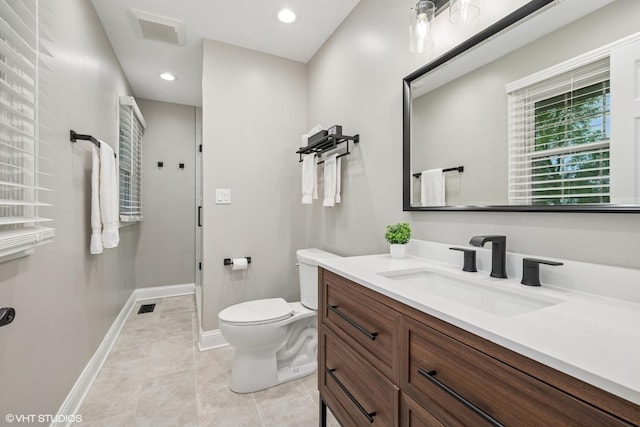 25 Lagoon Dr, Hawthorn Woods, IL 60047 - full bath featuring toilet, a stall shower, vanity, baseboards, and recessed lighting