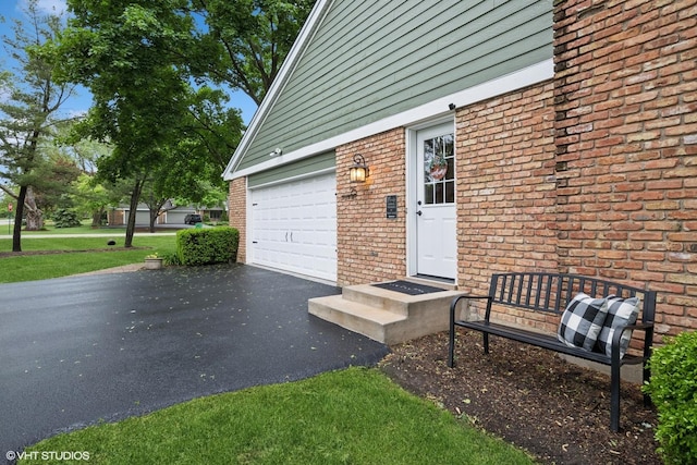 25 Lagoon Dr, Hawthorn Woods, IL 60047 - garage featuring asphalt driveway