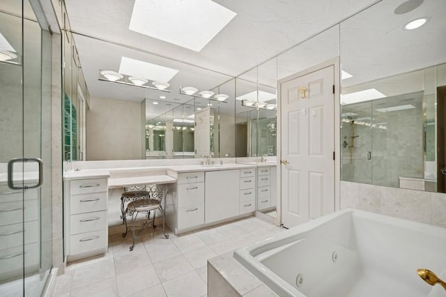 1700 2nd St Unit 509, Highland Park, IL 60035 - full bath featuring a skylight, a shower stall, a jetted tub, vanity, and tile patterned flooring