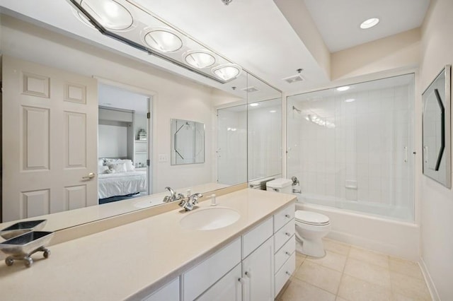 1700 2nd St Unit 509, Highland Park, IL 60035 - ensuite bathroom featuring tile patterned floors, vanity, toilet, bathtub / shower combination, and baseboards