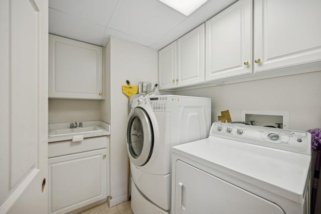 1700 2nd St Unit 509, Highland Park, IL 60035 - clothes washing area with washer and clothes dryer and cabinet space