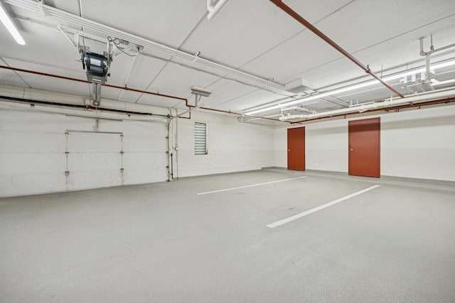 1700 2nd St Unit 509, Highland Park, IL 60035 - garage featuring a garage door opener