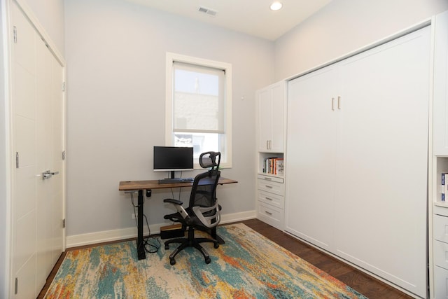 office featuring dark wood finished floors, recessed lighting, and baseboards