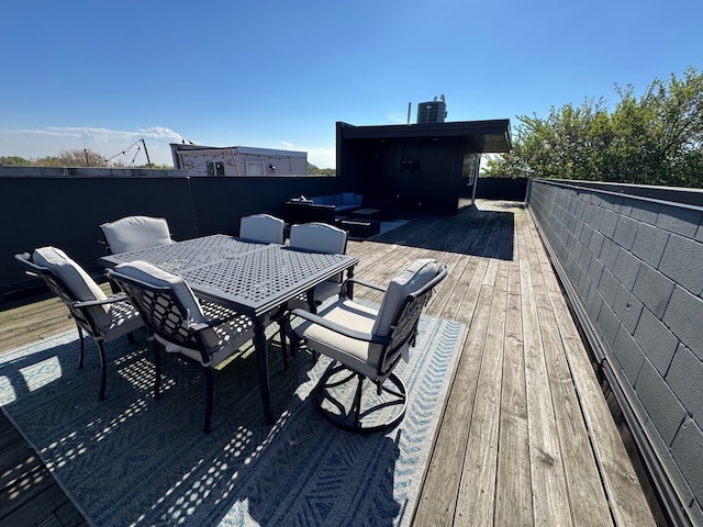 deck featuring outdoor dining space