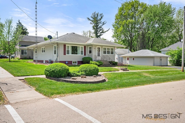 124 E 2nd St, Kingston, IL 60145 - view of front of home featuring a front lawn and an outdoor structure
