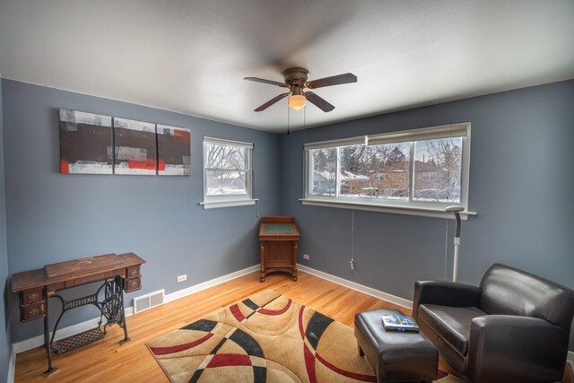 1841 Hawthorne Ave, Westchester, IL 60154 - living area featuring ceiling fan and wood finished floors