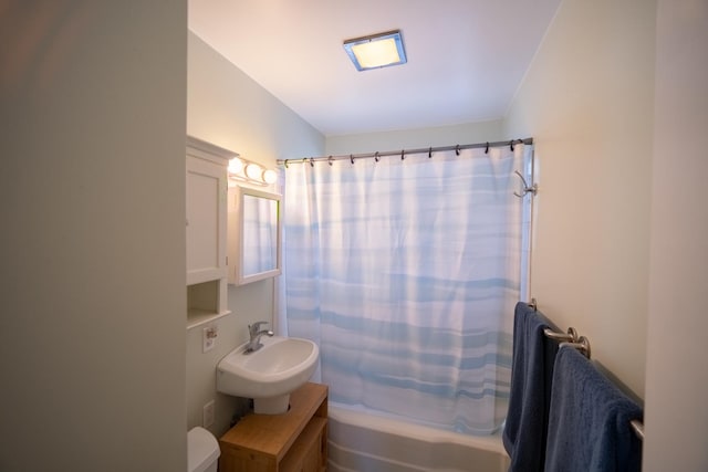 1841 Hawthorne Ave, Westchester, IL 60154 - bathroom featuring a sink and shower / tub combo with curtain