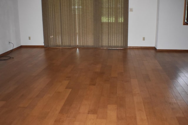 1925 W Mesa Dr Unit 1, Freeport, IL 61032 - spare room with hardwood / wood-style flooring and baseboards