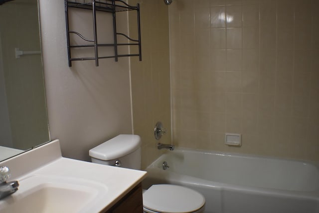 1925 W Mesa Dr Unit 1, Freeport, IL 61032 - bathroom featuring toilet, vanity, and washtub / shower combination