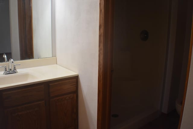 1925 W Mesa Dr Unit 1, Freeport, IL 61032 - full bathroom with a stall shower, vanity, and toilet