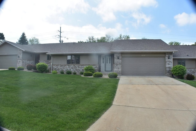 1925 W Mesa Dr Unit 1, Freeport, IL 61032 - ranch-style home featuring a garage, brick siding, a front lawn, and driveway