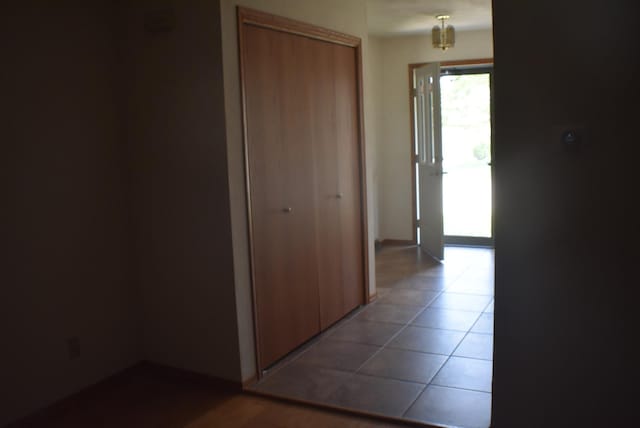 1925 W Mesa Dr Unit 1, Freeport, IL 61032 - hall with light tile patterned flooring