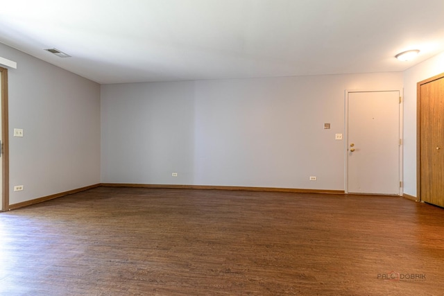 2442 Charleston Dr Unit 5, Schaumburg, IL 60193 - unfurnished room featuring wood finished floors and baseboards