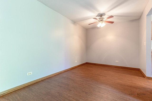 2442 Charleston Dr Unit 5, Schaumburg, IL 60193 - empty room with wood finished floors, ceiling fan, and baseboards