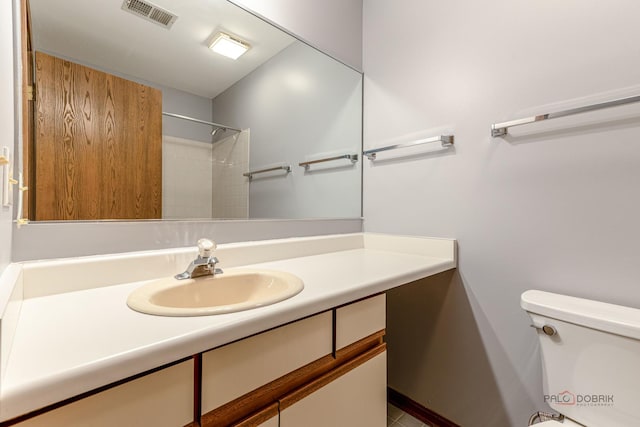 2442 Charleston Dr Unit 5, Schaumburg, IL 60193 - full bathroom featuring toilet, vanity, and a shower