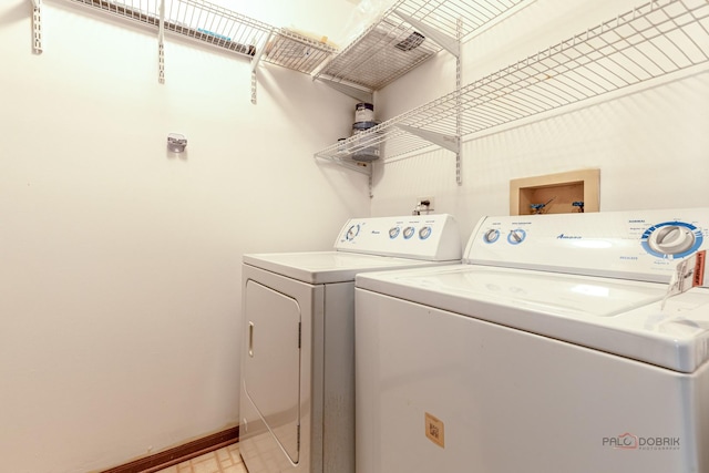 2442 Charleston Dr Unit 5, Schaumburg, IL 60193 - laundry room with washing machine and dryer and baseboards