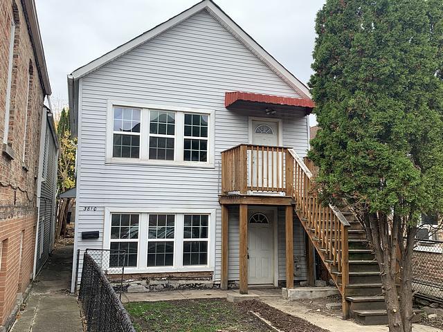 3810 S Wood St, Chicago, IL 60609 - view of front of house featuring fence and stairs