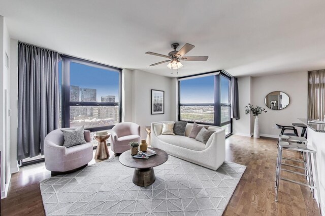 1160 S Michigan Ave Unit 1503, Chicago, IL 60605 - living area with floor to ceiling windows, ceiling fan, and wood finished floors