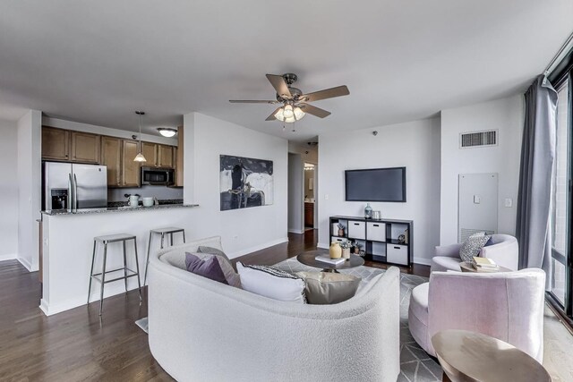 1160 S Michigan Ave Unit 1503, Chicago, IL 60605 - living area with dark wood-style flooring, a ceiling fan, and baseboards