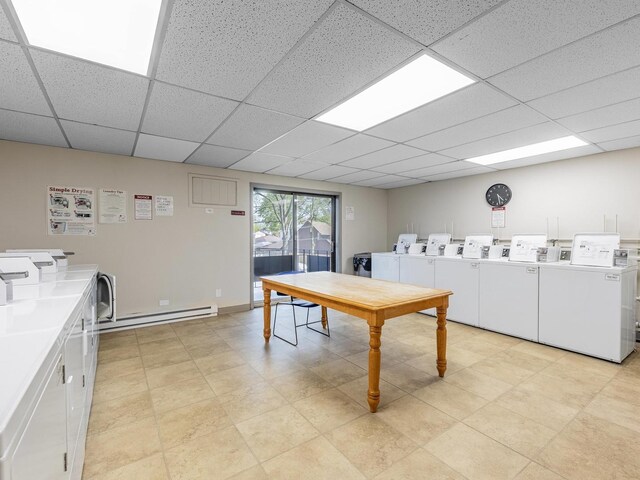 850 Des Plaines Ave Unit 207, Forest Park, IL 60130 - community laundry featuring baseboard heating and washing machine and clothes dryer