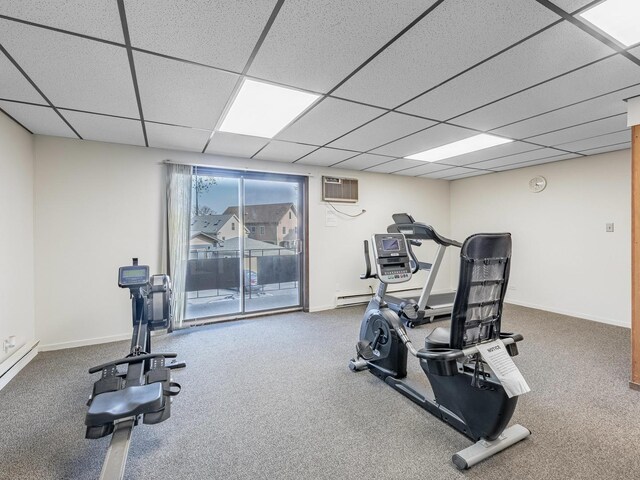 850 Des Plaines Ave Unit 207, Forest Park, IL 60130 - exercise room with carpet, baseboards, a drop ceiling, and a wall unit AC