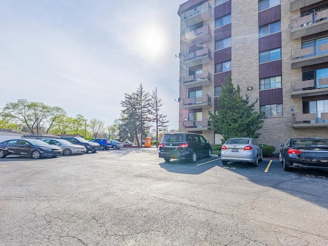 850 Des Plaines Ave Unit 207, Forest Park, IL 60130 - view of apartment building / complex featuring uncovered parking