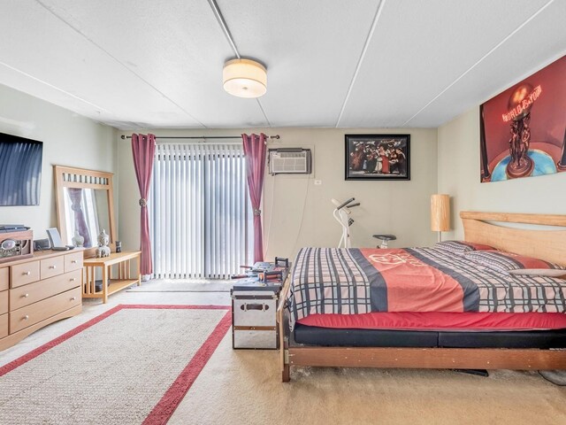 850 Des Plaines Ave Unit 207, Forest Park, IL 60130 - bedroom featuring a wall mounted air conditioner and carpet