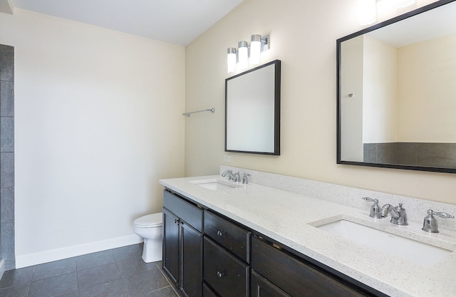 1600 S Prairie Ave Unit 810, Chicago, IL 60616 - full bathroom featuring double vanity, toilet, tile patterned floors, and baseboards