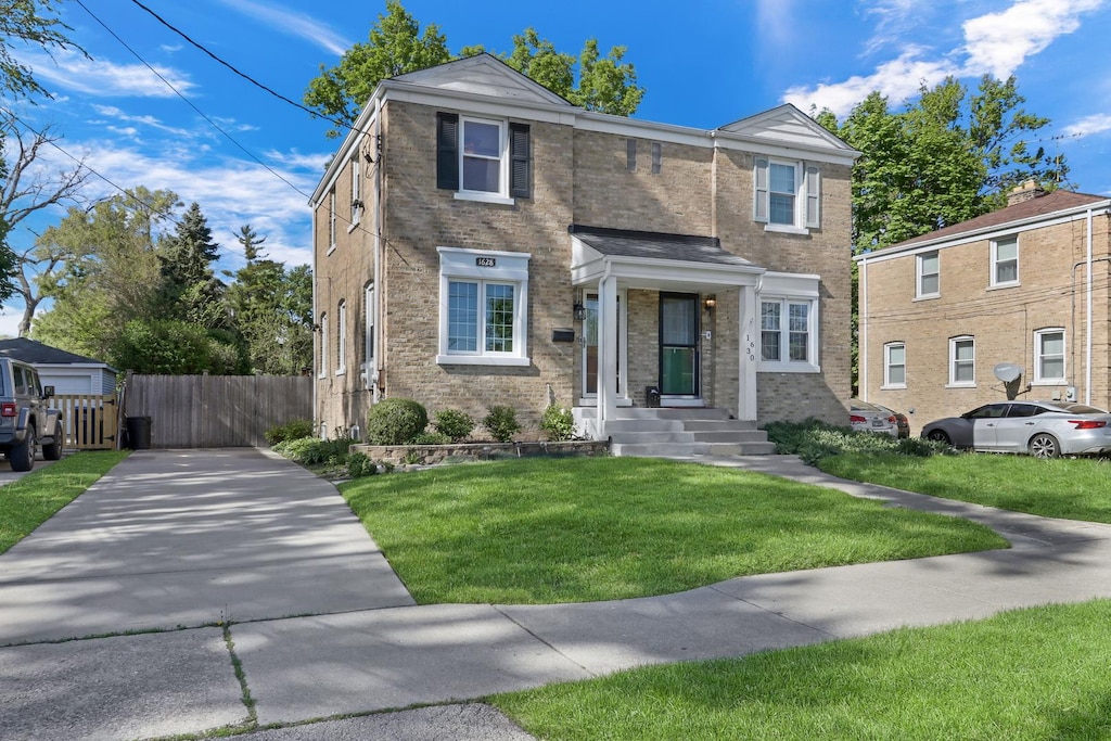 1628 Prospect Ave, Des Plaines, IL 60018 - view of front of property featuring brick siding and driveway