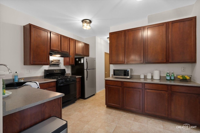 239 Nicole Dr Unit A, South Elgin, IL 60177 - kitchen featuring appliances with stainless steel finishes, under cabinet range hood, and a sink