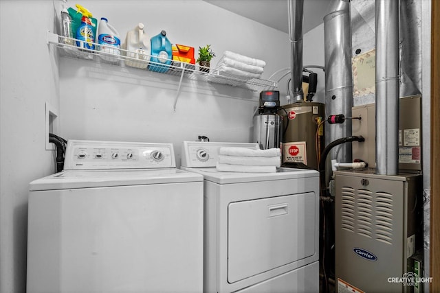 239 Nicole Dr Unit A, South Elgin, IL 60177 - laundry room with washing machine and dryer, heating unit, and water heater