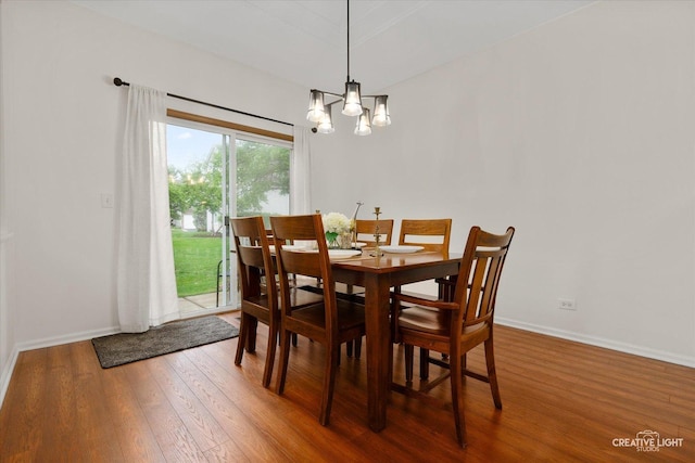 239 Nicole Dr Unit A, South Elgin, IL 60177 - dining room with wood finished floors, baseboards, and a chandelier