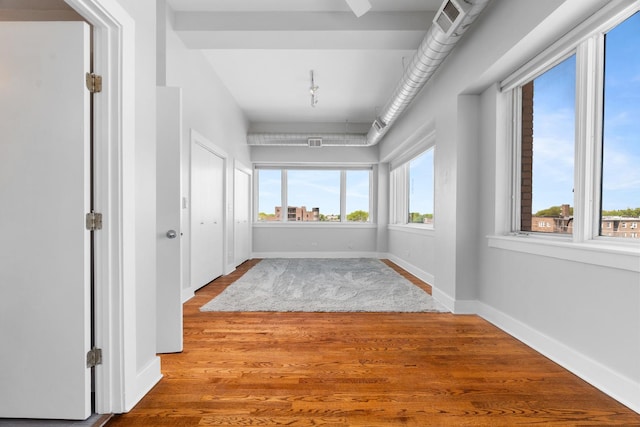 4751 N Artesian Ave Unit 401, Chicago, IL 60625 - corridor featuring wood finished floors and baseboards