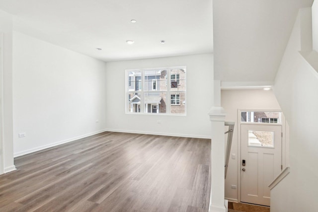 6335 Ulster Dr, Tinley Park, IL 60477 - unfurnished living room with plenty of natural light, wood finished floors, baseboards, and recessed lighting
