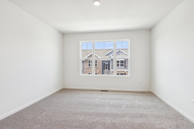 6335 Ulster Dr, Tinley Park, IL 60477 - carpeted empty room with baseboards
