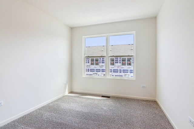 6335 Ulster Dr, Tinley Park, IL 60477 - spare room featuring carpet floors and baseboards