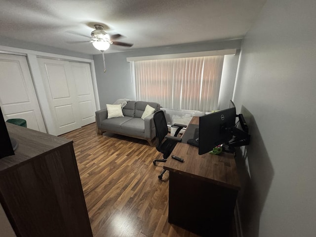 office featuring wood finished floors and ceiling fan