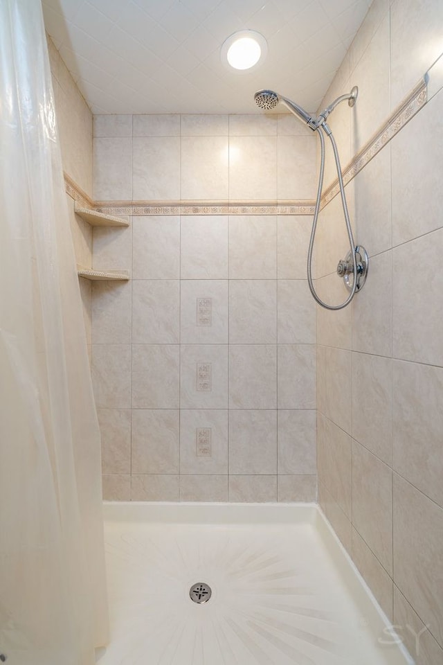 bathroom featuring a stall shower