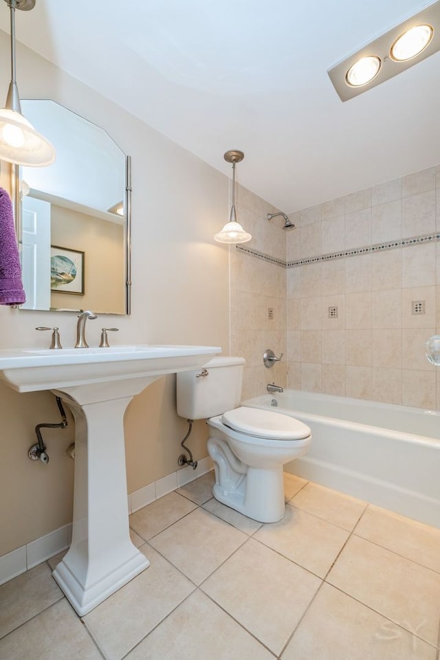 full bathroom with tile patterned flooring, shower / washtub combination, and toilet